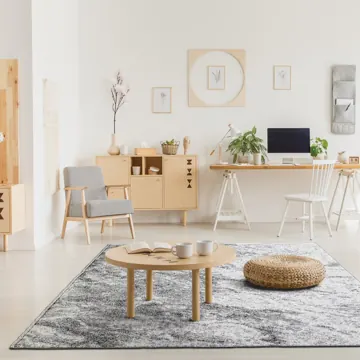Beenom rug in a home workspace