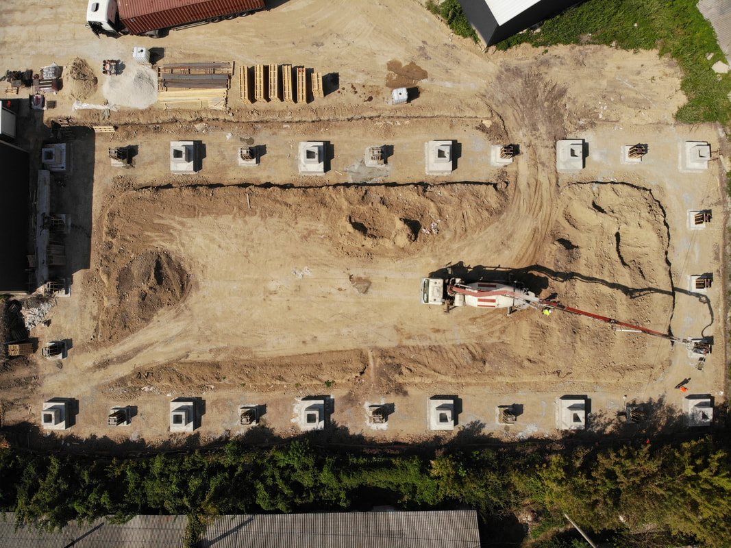 A bare field in Ungheni — construction of the Unicorn Carpets factory begins